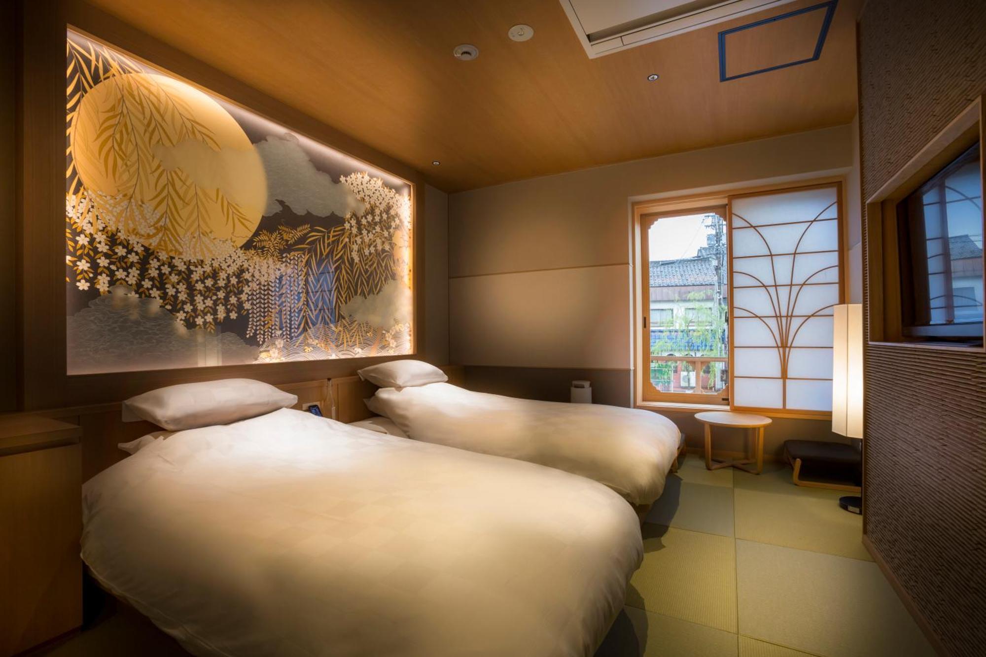 Kinosaki Onsen Tokitotoki Hotell Toyooka  Rum bild